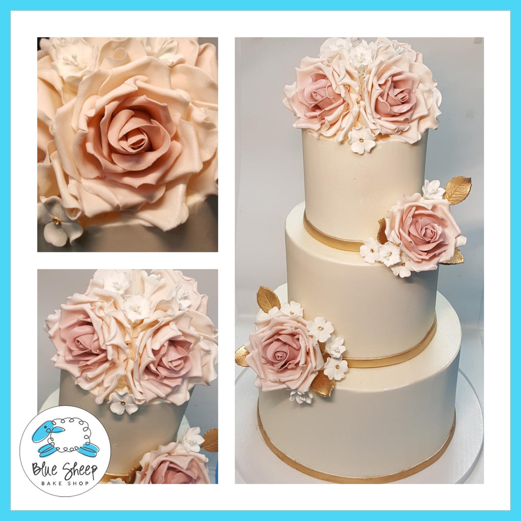 blush and ivory buttercream wedding cake with sugar roses nj