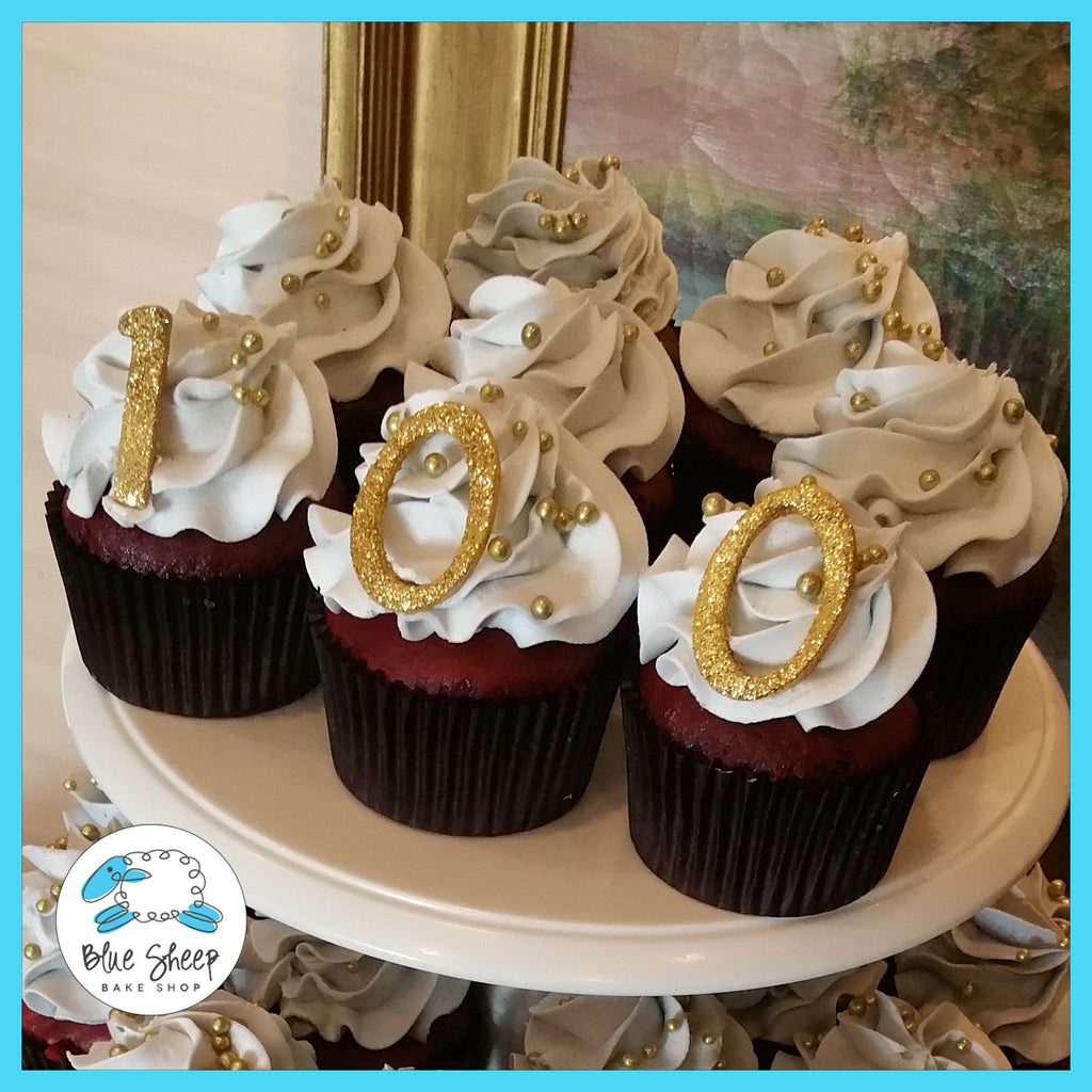 100 days cupcake tower with gold glittery cupcake topper