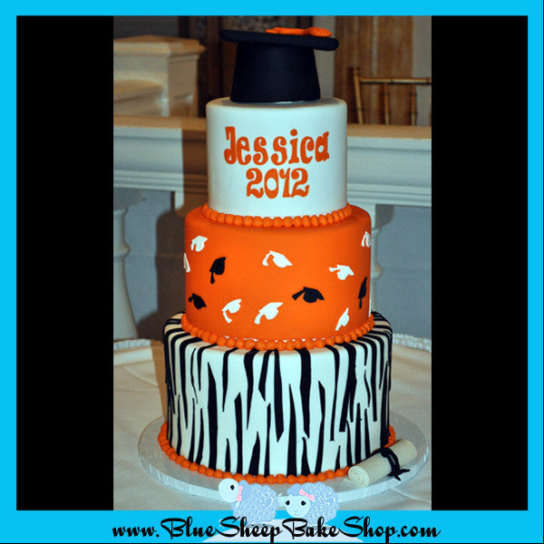 zebra and and orange high school graduation cake