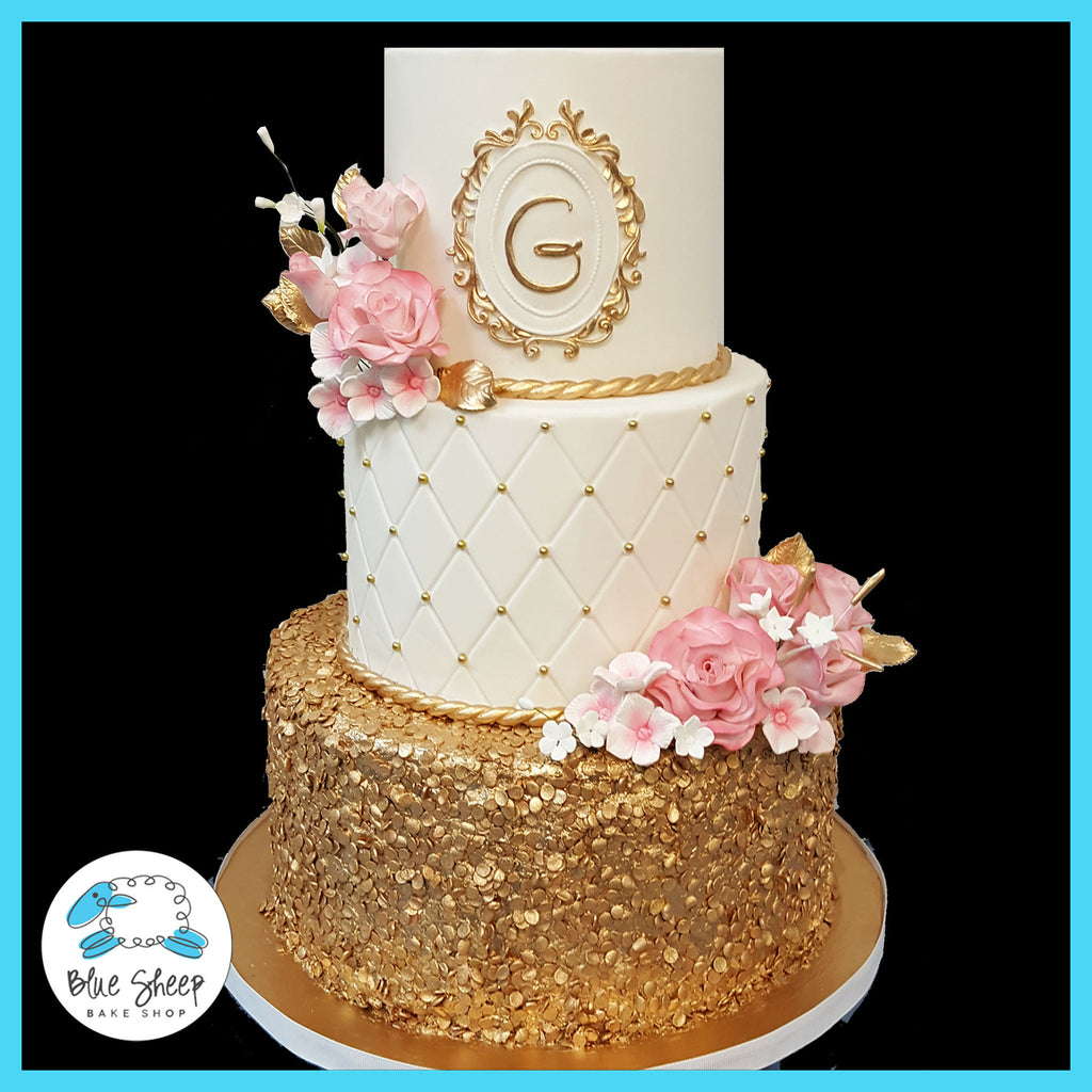 pink and gold wedding cake nj