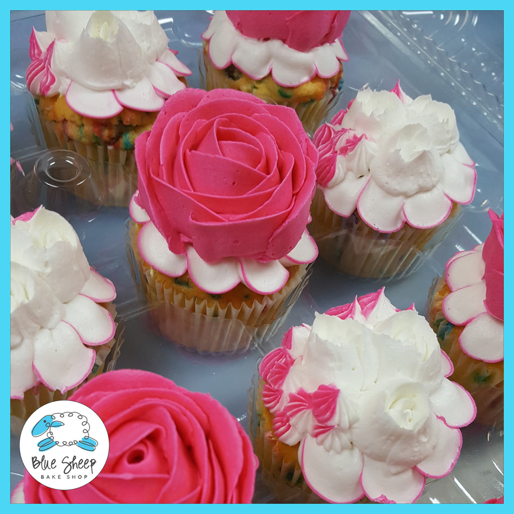 white and pink rose cupcakes