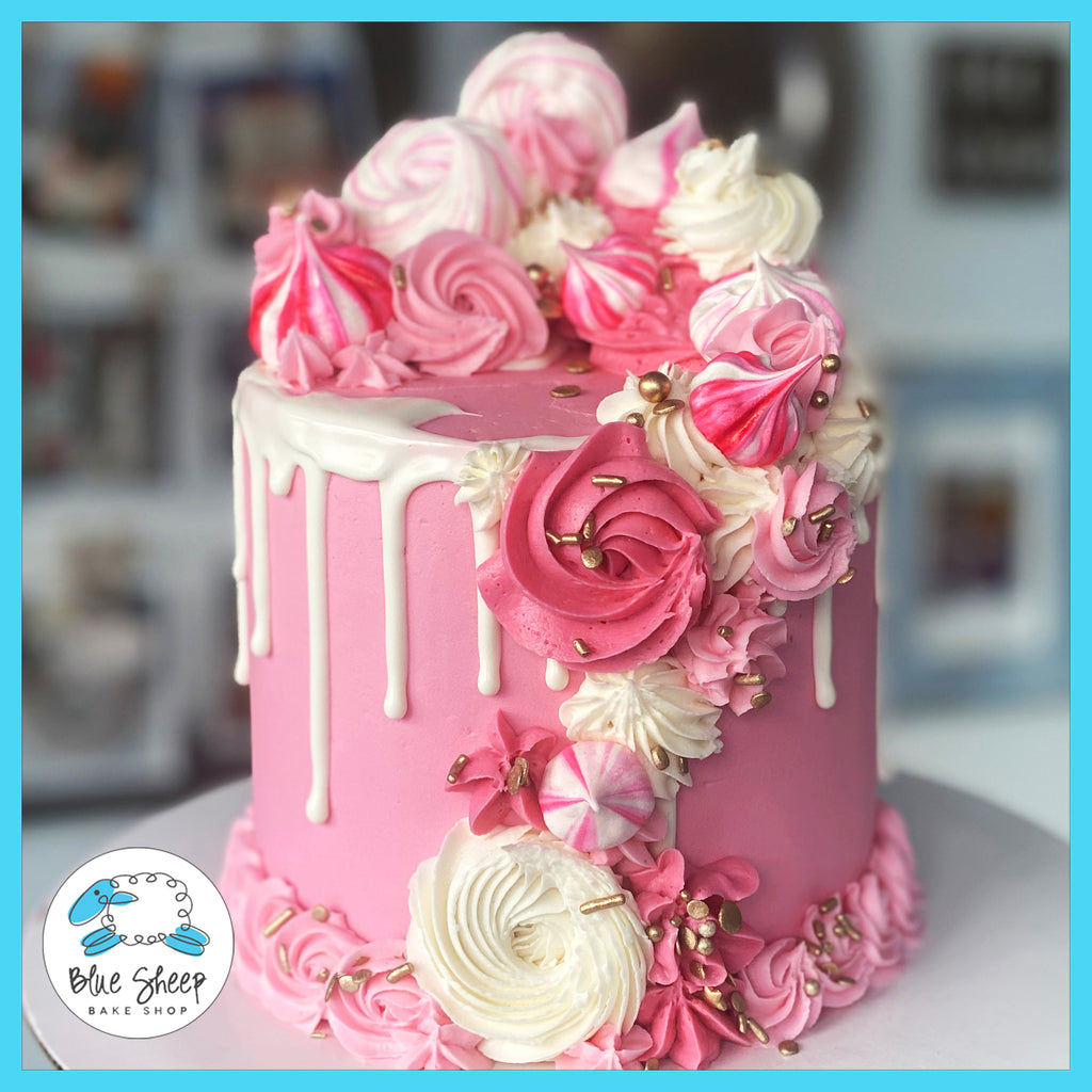 pink merengue birthday cake
